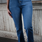 A close up shot of the front of the high rise bootcut kancan jeans.