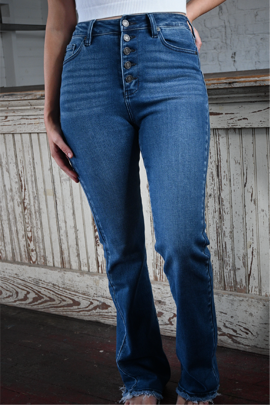 A close up shot of the front of the high rise bootcut kancan jeans.