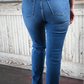 A close up shot of the back of the high rise bootcut kancan jeans.